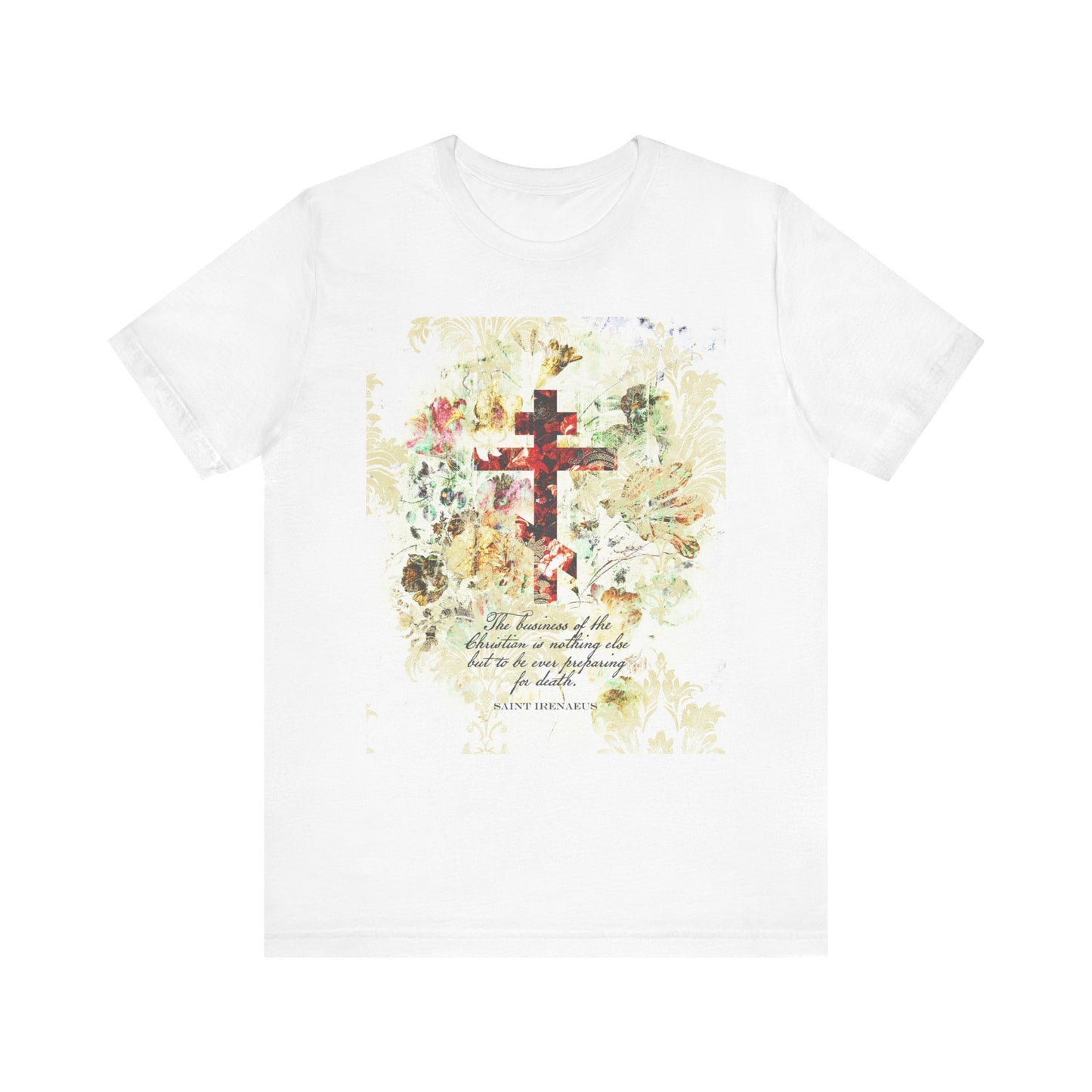 White & beige unisex tee featuring a floral scrapbook-texture cross in an arts & crafts style, inspired by St. Irenaeus’s teachings on preparing for death, with an ornate background and lightweight cotton feel.
