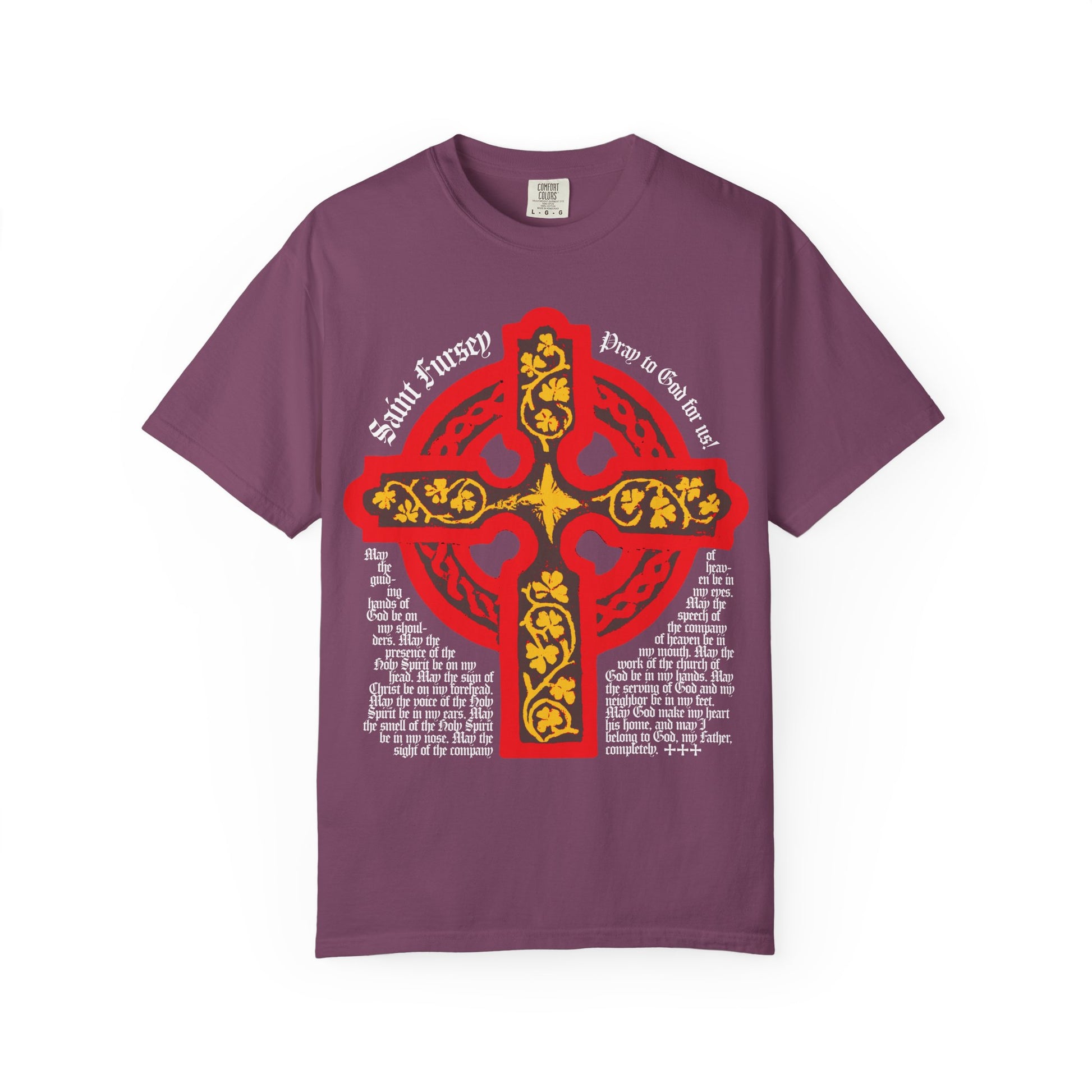 Berry-colored heavyweight cotton tee featuring a bold red and yellow Celtic cross and medieval-style text with the Lorica Shield Prayer of St Fursey, inspired by ancient Irish Orthodox tradition.