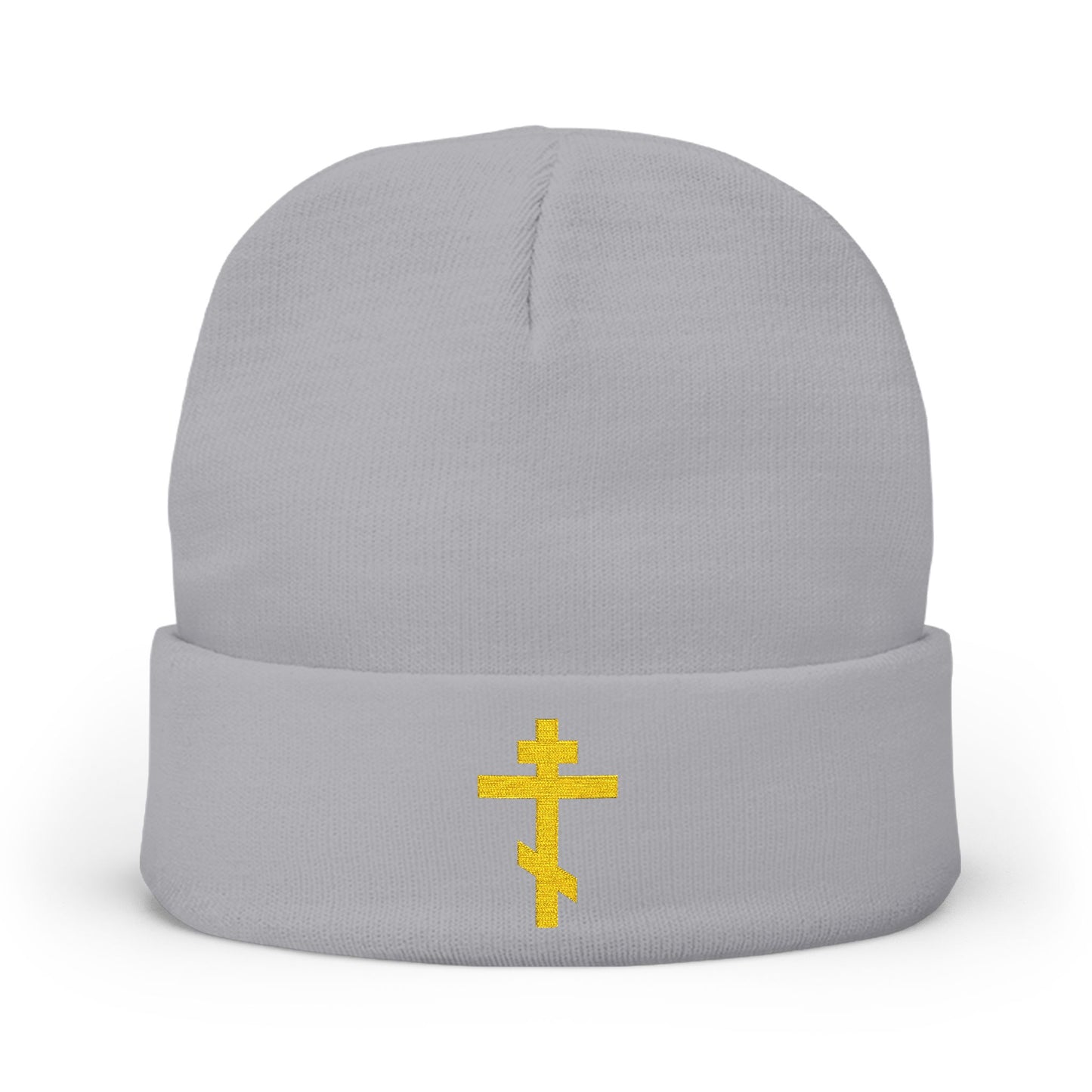 Gray knit beanie featuring a yellow Orthodox TriBar Cross embroidery and the phrase "Nail My Passions to the Wood of Thy Precious Cross O Lord." A meaningful accessory for Orthodox Christians.