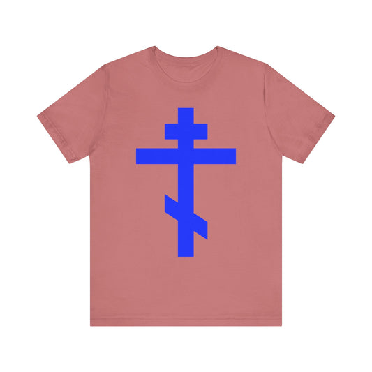 Mauve t-shirt featuring a bold royal blue Orthodox Tribar Cross design centered on the front, inscribed with "Preserve Thy People By Thy Cross, O Lord" and "Christ is King." Lightweight cotton unisex tee.