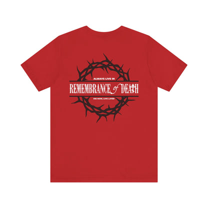 The "Always Live In Remembrance of Death" unisex tee features a black crown of thorns and text on the back, plus a red cross on the front left breast. Inspired by St John Climacus, it's crafted from lightweight cotton.