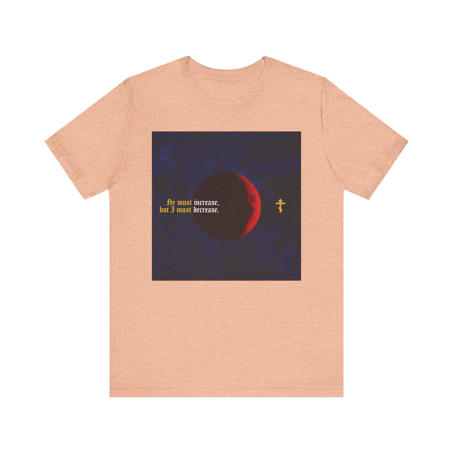 Heather peach unisex tee featuring a red moon, yellow gothic text “He must increase, but I must decrease” (John 3:30), and a small cross. Inspired by John the Baptist during the purification dispute. Lightweight cotton.