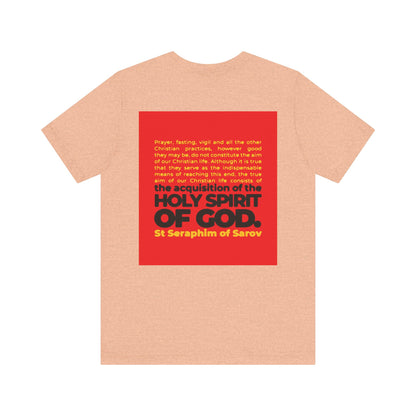 True Aim of Christian Life is Acquisition of the Holy Spirit—Orthodox unisex cotton tee with a St. Seraphim of Sarov quote on a red square on the back in yellow and black text. Two-sided IconoGraphic design.