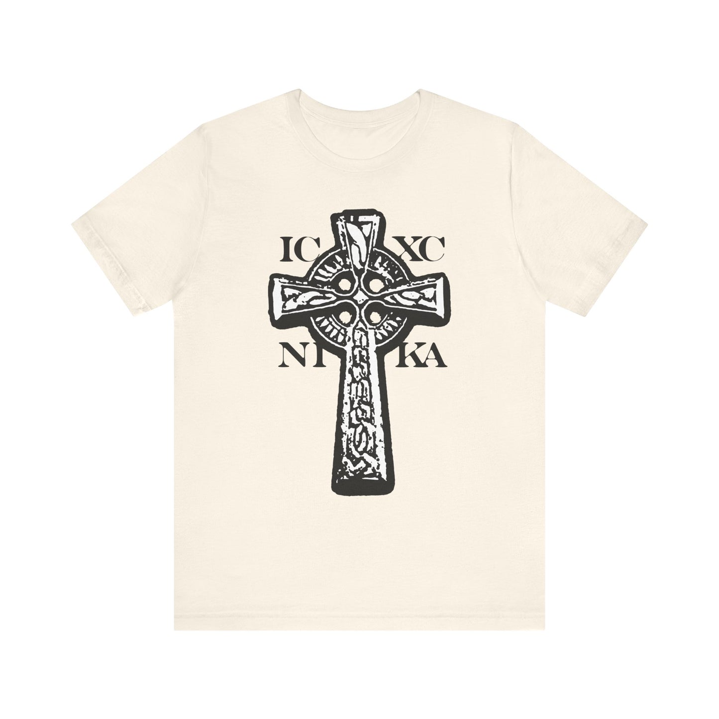 Natural lightweight cotton unisex T-shirt featuring a bold black and white Celtic knotwork cross on a red background, with the letters IC XC NI KA—“Jesus Christ Conquers”—circling the design to represent the power of Christ Crucified and the enduring strength of His Cross.