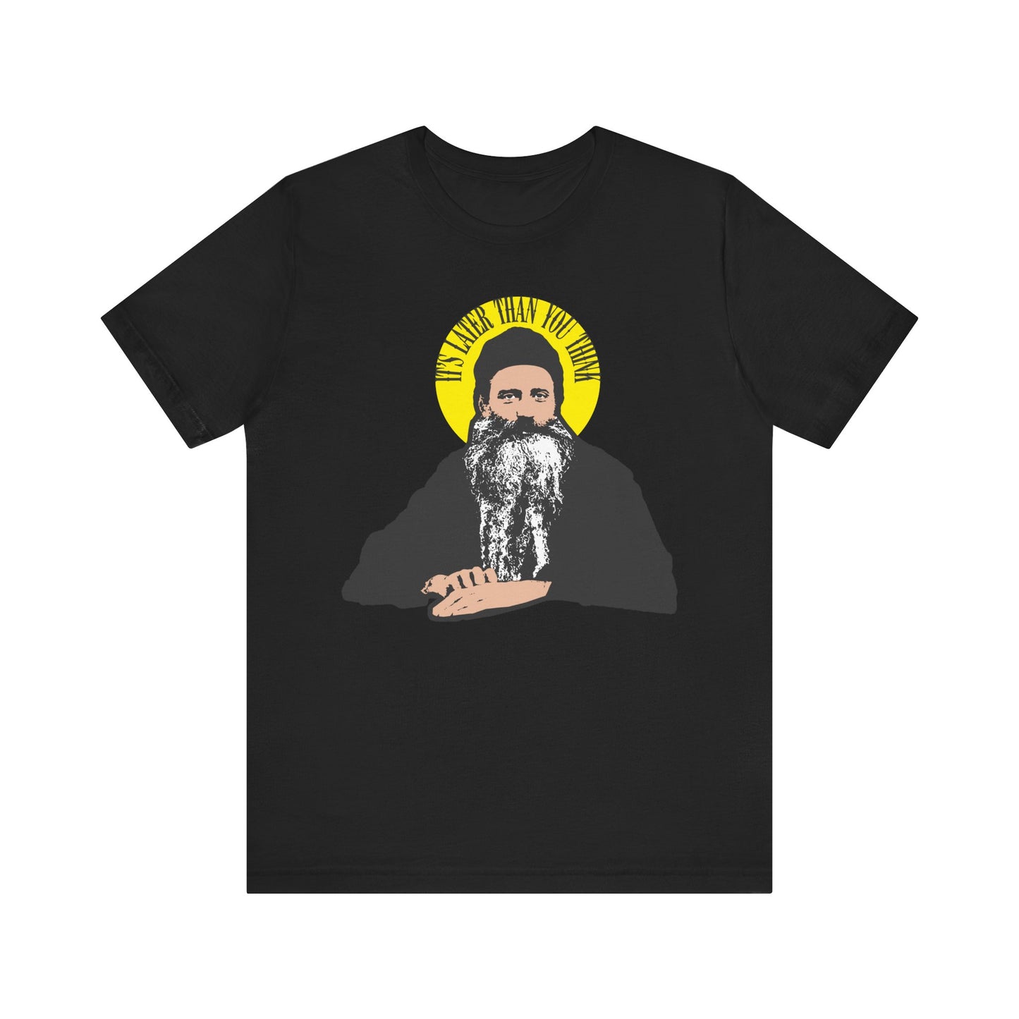 Black t-shirt with “It’s Later Than You Think” and St. Seraphim Rose in a yellow halo, inspired by the Modern American Orthodox saint. Lightweight cotton unisex tee.