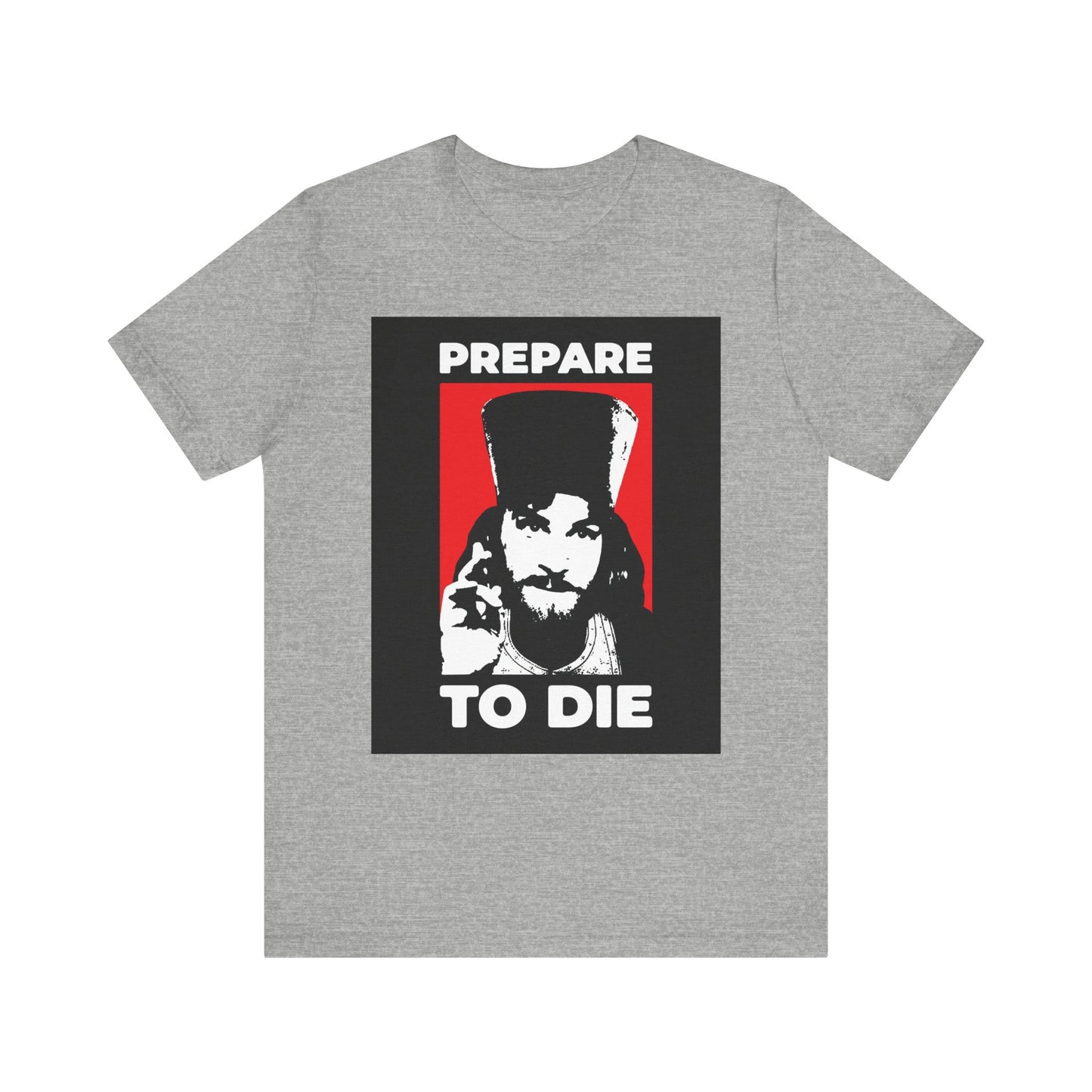 Athletic Heather T-shirt featuring a black, white, and red graphic of Inigo Montoya as an Orthodox priest giving a blessing, with the text "PREPARE TO DIE"—a bold reminder to recall the hour of death, inspired by St. Hesychius in Christian tradition. This lightweight cotton unisex shirt is part of the "Prepare to Die | Remember You Will Die" collection and draws from The Princess Bride.