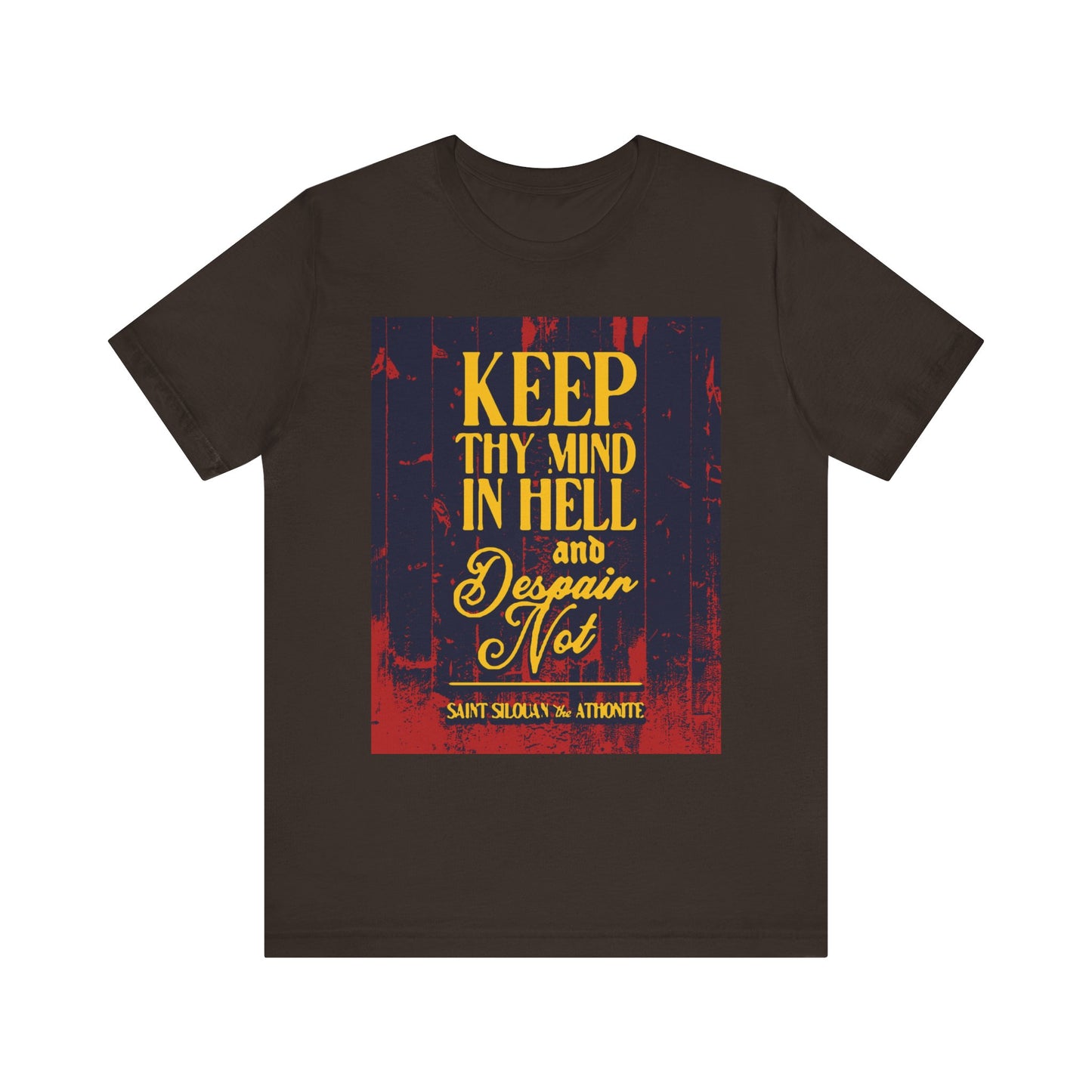Brown Orthodox Christian lightweight cotton unisex tee featuring St. Silouan the Athonite’s words: “Keep thy mind in hell and despair not” in yellow and red text—a reminder of humility and spiritual warfare.