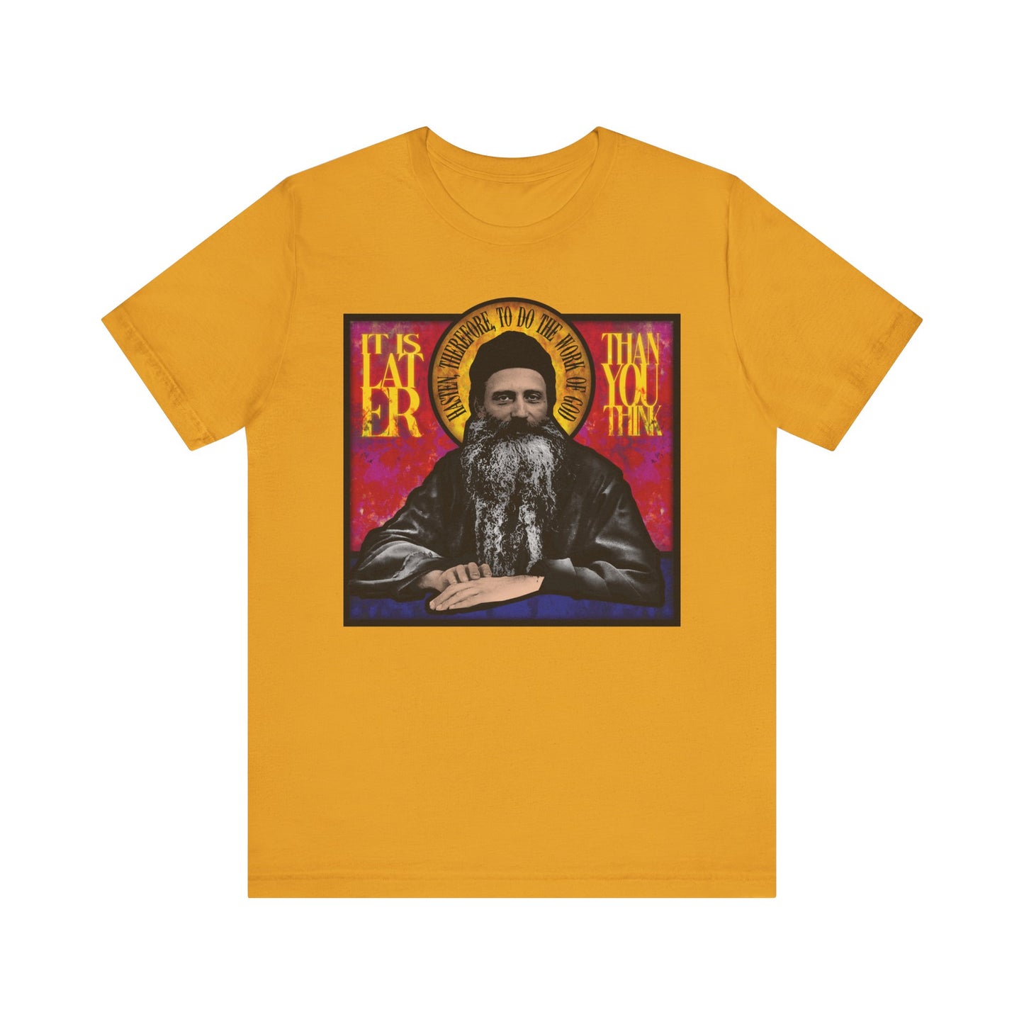 Mustard t-shirt featuring a stained glass-style image of Fr. Seraphim Rose and the reminder: "It is later than you think"—inspired by the American Orthodox monastic saint. Lightweight cotton, unisex fit.