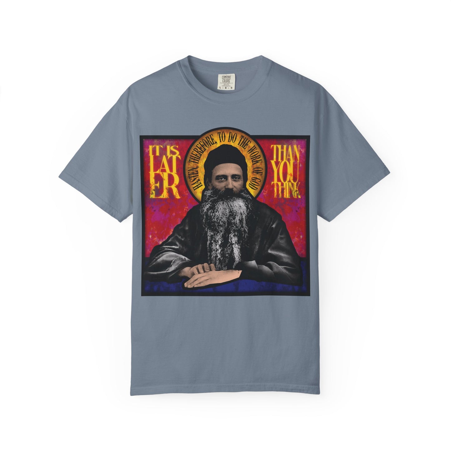 Heavyweight cotton unisex T-shirt featuring a stained glass design of Fr. Seraphim Rose with the message “It is later than you think,” inspired by American Orthodox monastic themes and the Kingdom of Heaven.