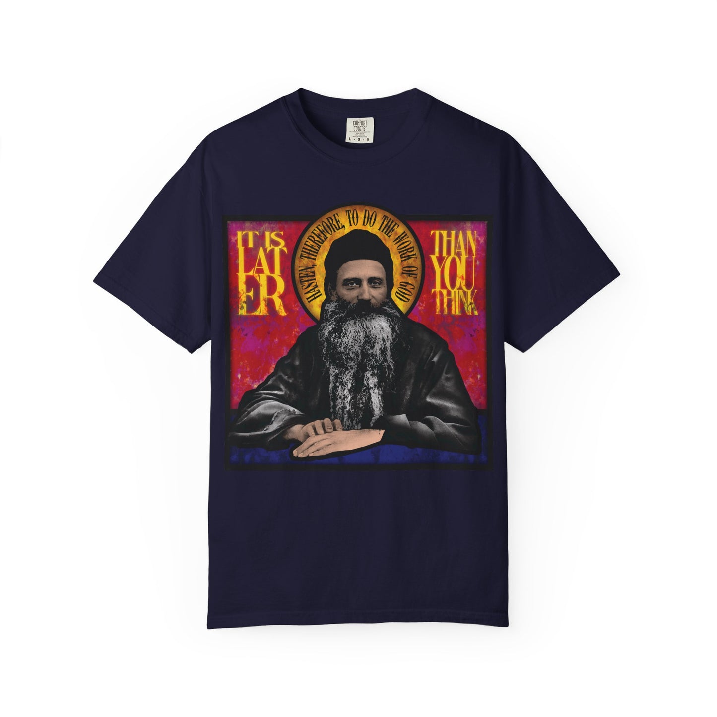 Navy heavyweight cotton unisex t-shirt featuring a stained glass design of Fr. Seraphim Rose and the text “It Is Later Than You Think,” inspired by this American Orthodox monastic saint.