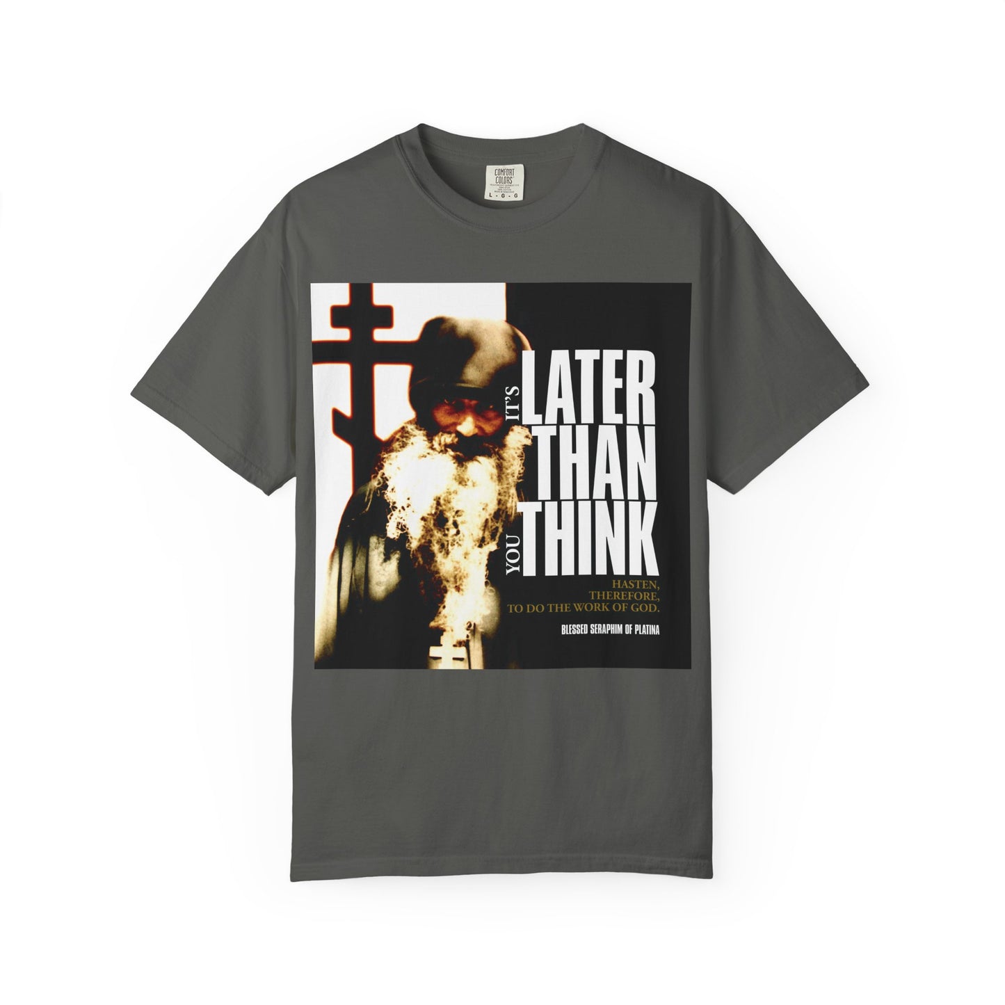 Pepper-colored heavyweight cotton unisex T-shirt featuring a photo of Fr Seraphim Rose and modern cinematic poster typography with the phrase "It's Later Than You Think" on the front.