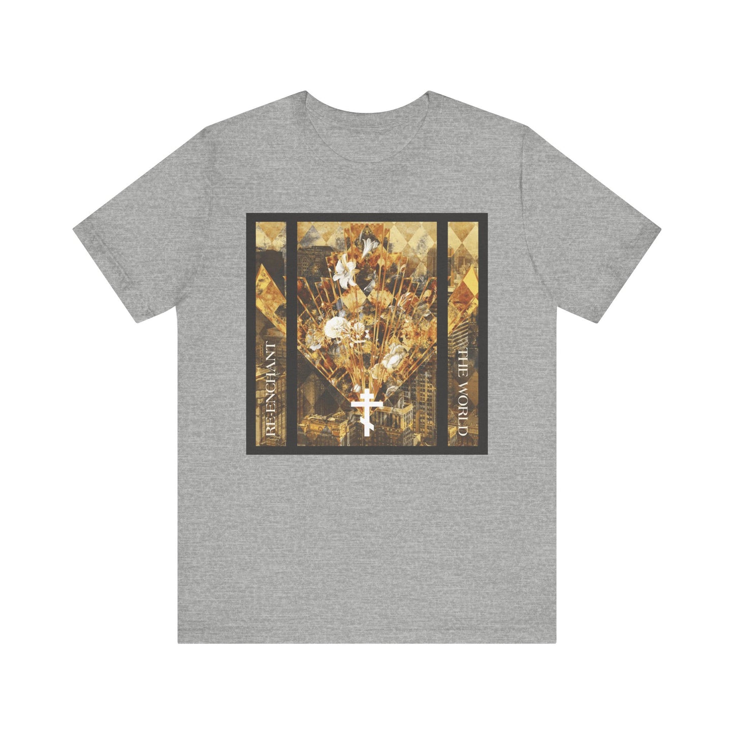 Athletic Heather tee featuring a modern earthtone cityscape graphic with a white cross and floral elements, along with the words RESILIENT and THE WORK OF ART—part of the "Re-Enchant the World" collection, honoring the Guardian of the Whole World and celebrating the Beauty of the Church.