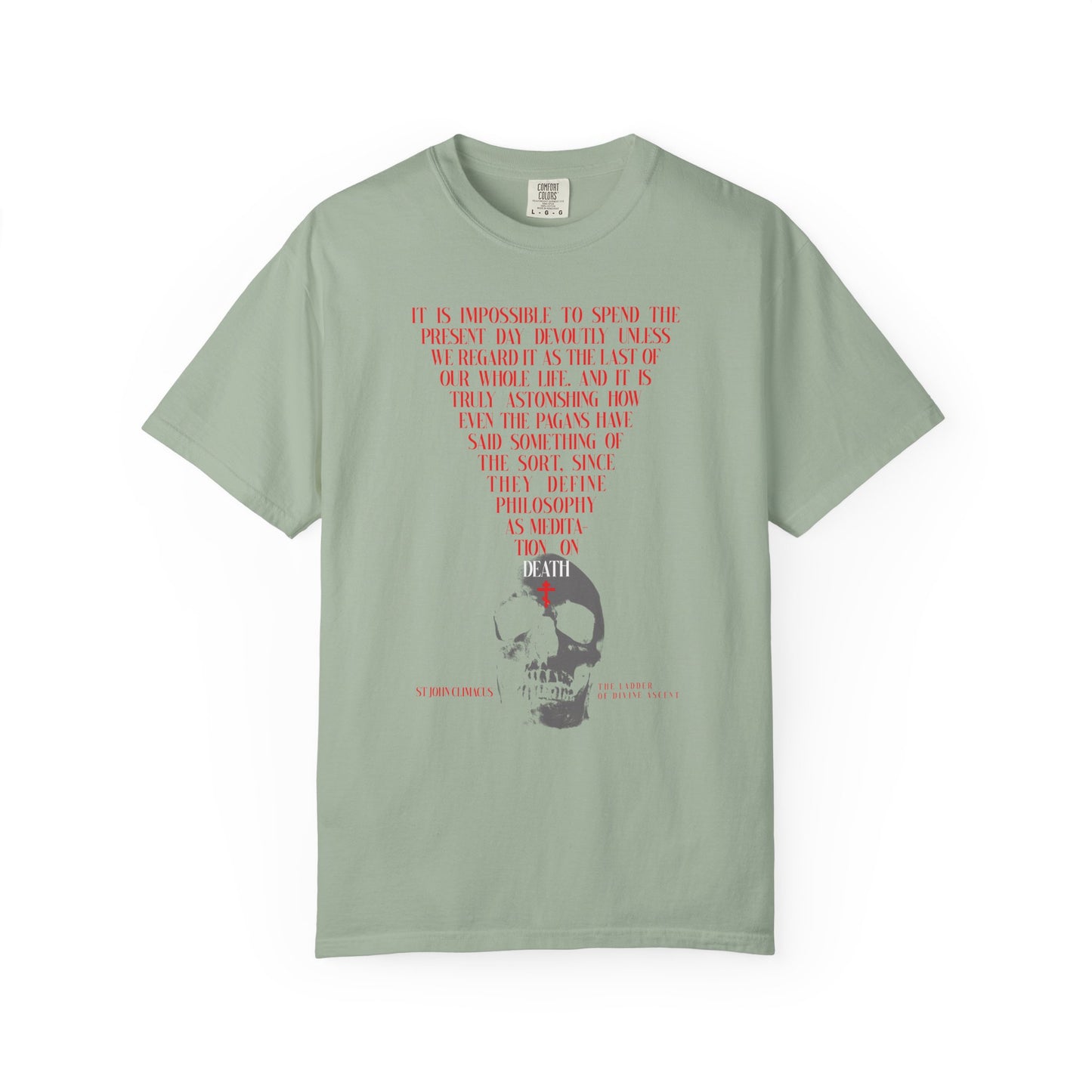 Bay-colored heavyweight cotton unisex tee featuring "The Present Day As the Last Day of Our Life" in red text above a black and white skull with a red Orthodox cross; inspired by St John Climacus. Memento Mori design on the front.