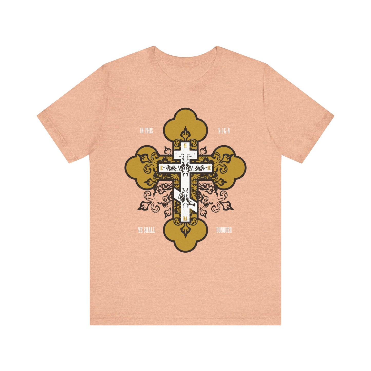 Heather Peach unisex tee featuring a gold & white ornate Orthodox cross with "In This Sign Ye Shall Conquer" text. Lightweight cotton inspired by "In Hoc Signo Vinces.
