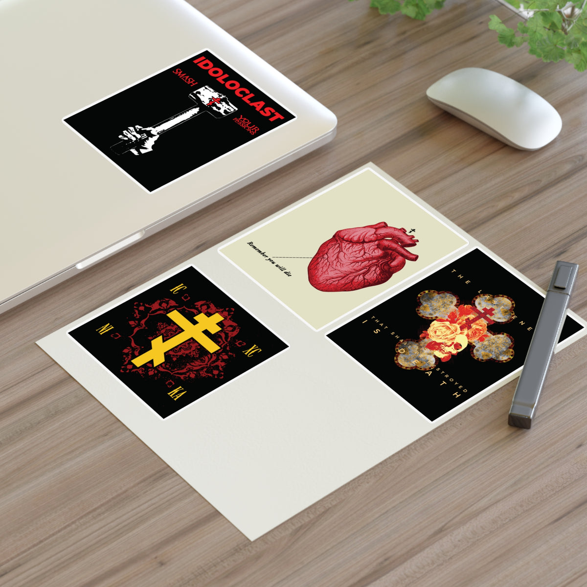 Bestseller Mix No. 2 Four Orthodox Stickers on a desk beside a mouse and laptop.