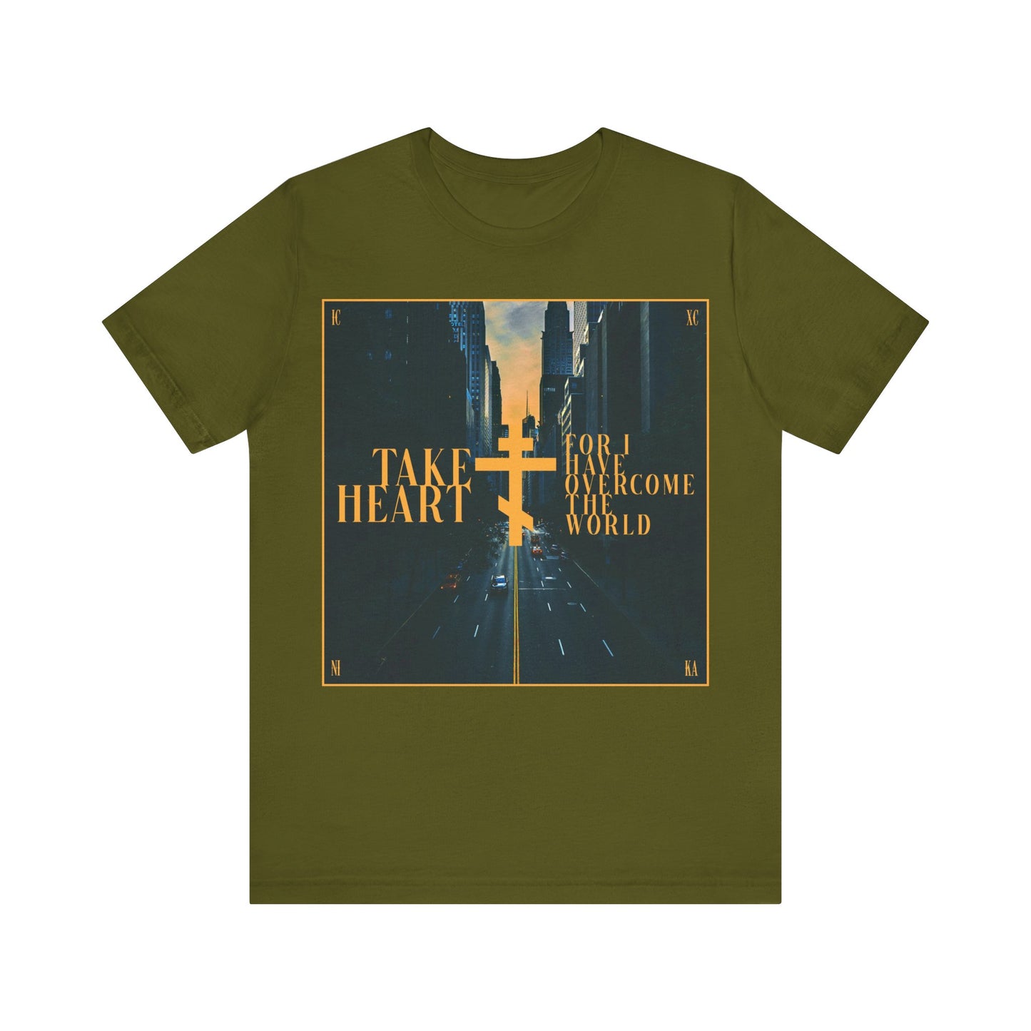 Show your faith and hope in this olive cotton T-shirt featuring a redemptive, modern city street scene and John 16:33: "Take Heart, For I Have Overcome the World." Orthodox Christian design with gold cross.