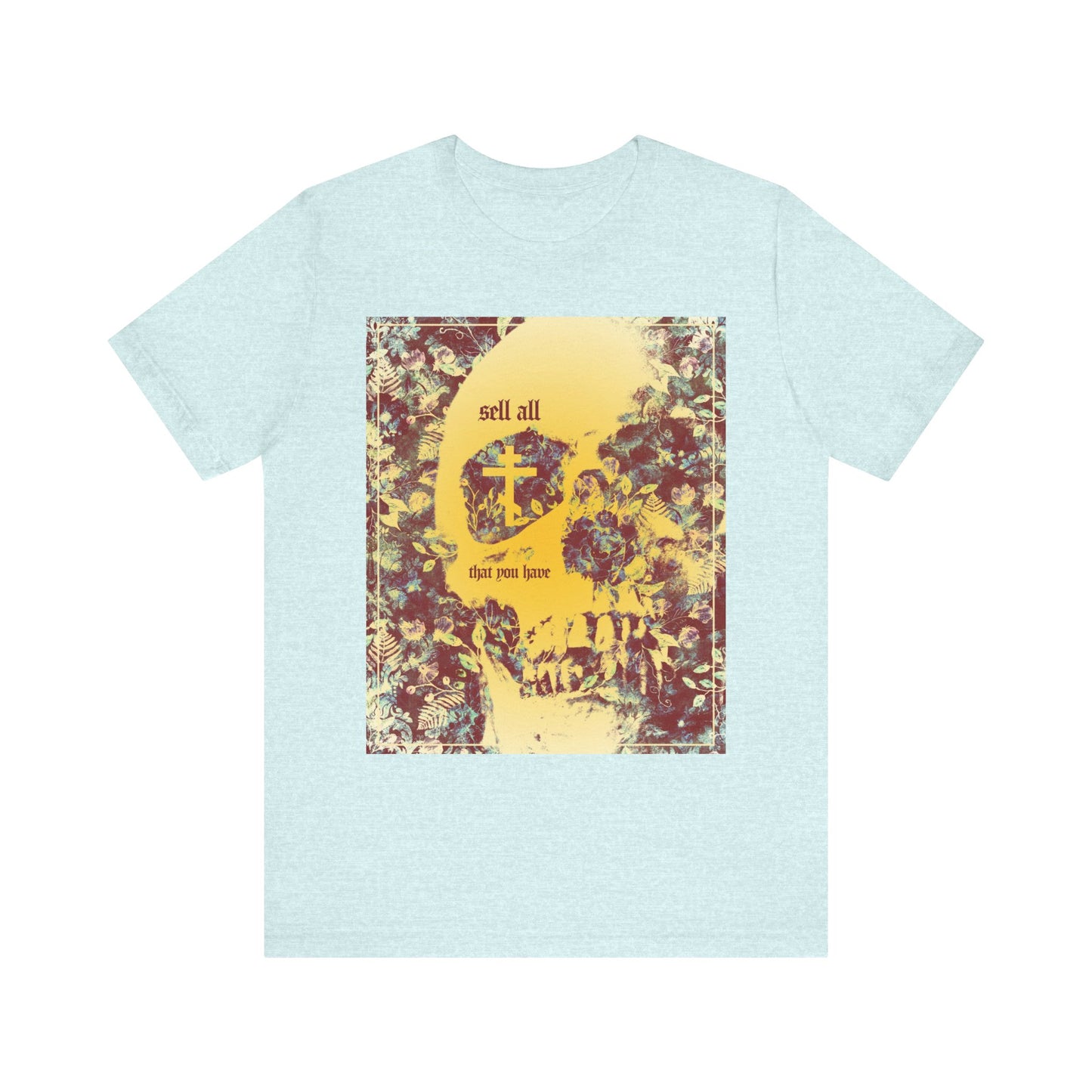Heather Prism Ice Blue unisex cotton tee featuring a bold, artistic yellow skull intertwined with floral and leafy motifs, accented by an Orthodox Cross. The front displays “Sell All That You Have,” subtly reflecting the Christian call to keep the commandments on the path to the kingdom of heaven.