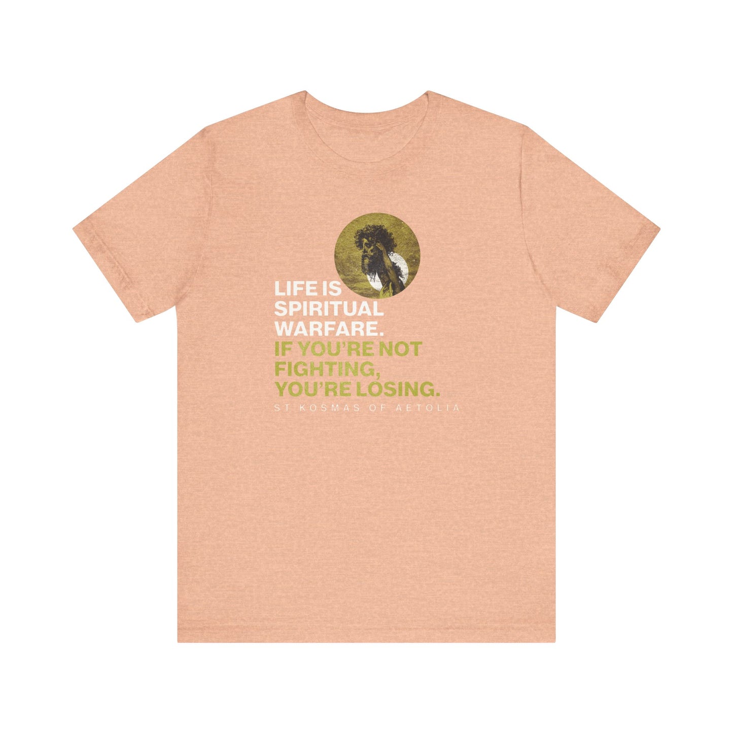 Heather Peach unisex tee featuring "Life is spiritual warfare. If you're not fighting, you're losing," with a lion inspired by Psalm 151. Design references St Kosmas of Aetolia, Gustave Dore, and Orthodox themes.