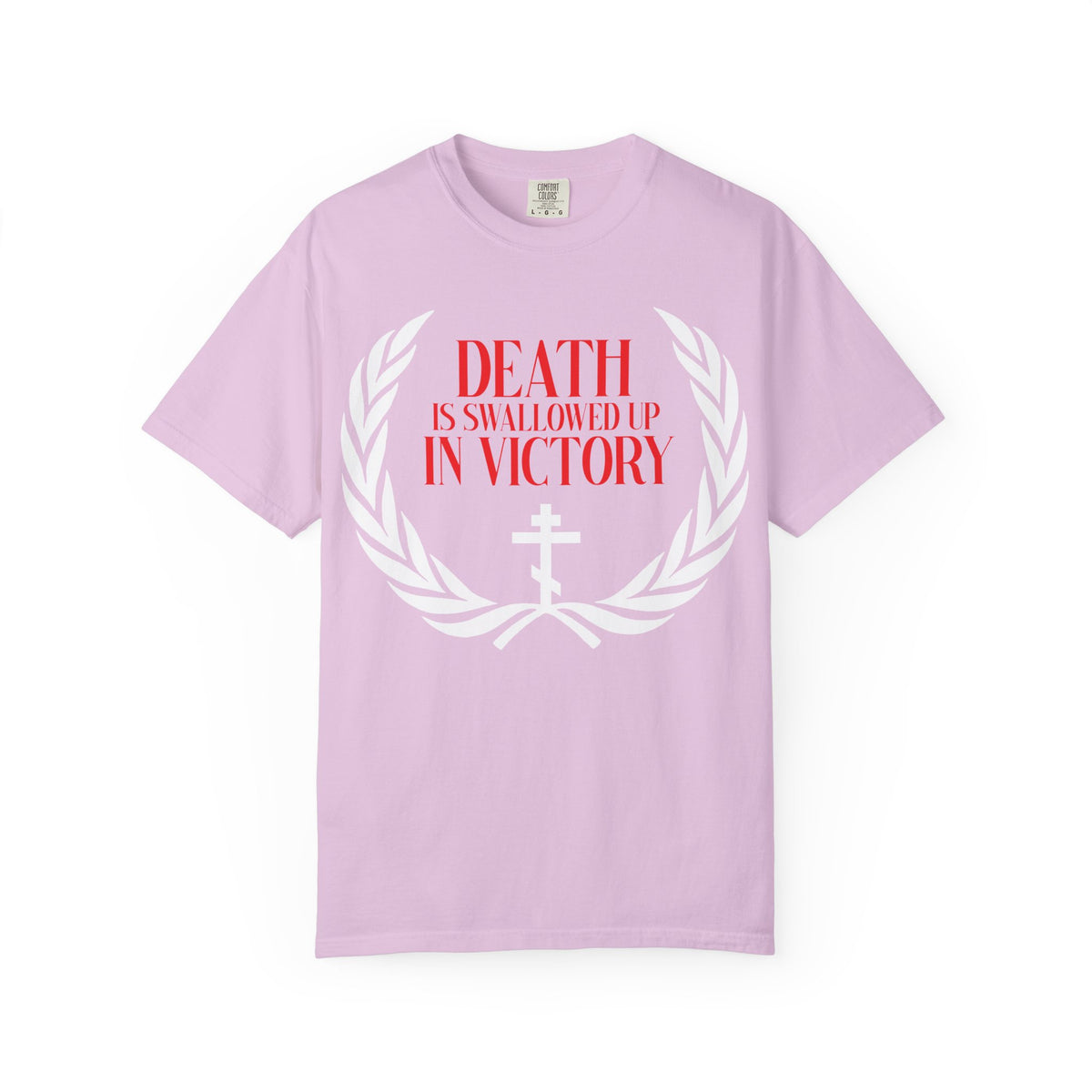Orchid “Death is Swallowed Up In Victory (1 Cor 15:54)” heavyweight cotton t-shirt, featuring a white Orthodox cross and laurel wreath with red lettering—an enduring symbol of immortality and incorruption.