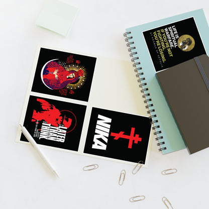 Open notebook with Bestseller Orthodox Sticker Mix No. 5 and office supplies on a white desk.