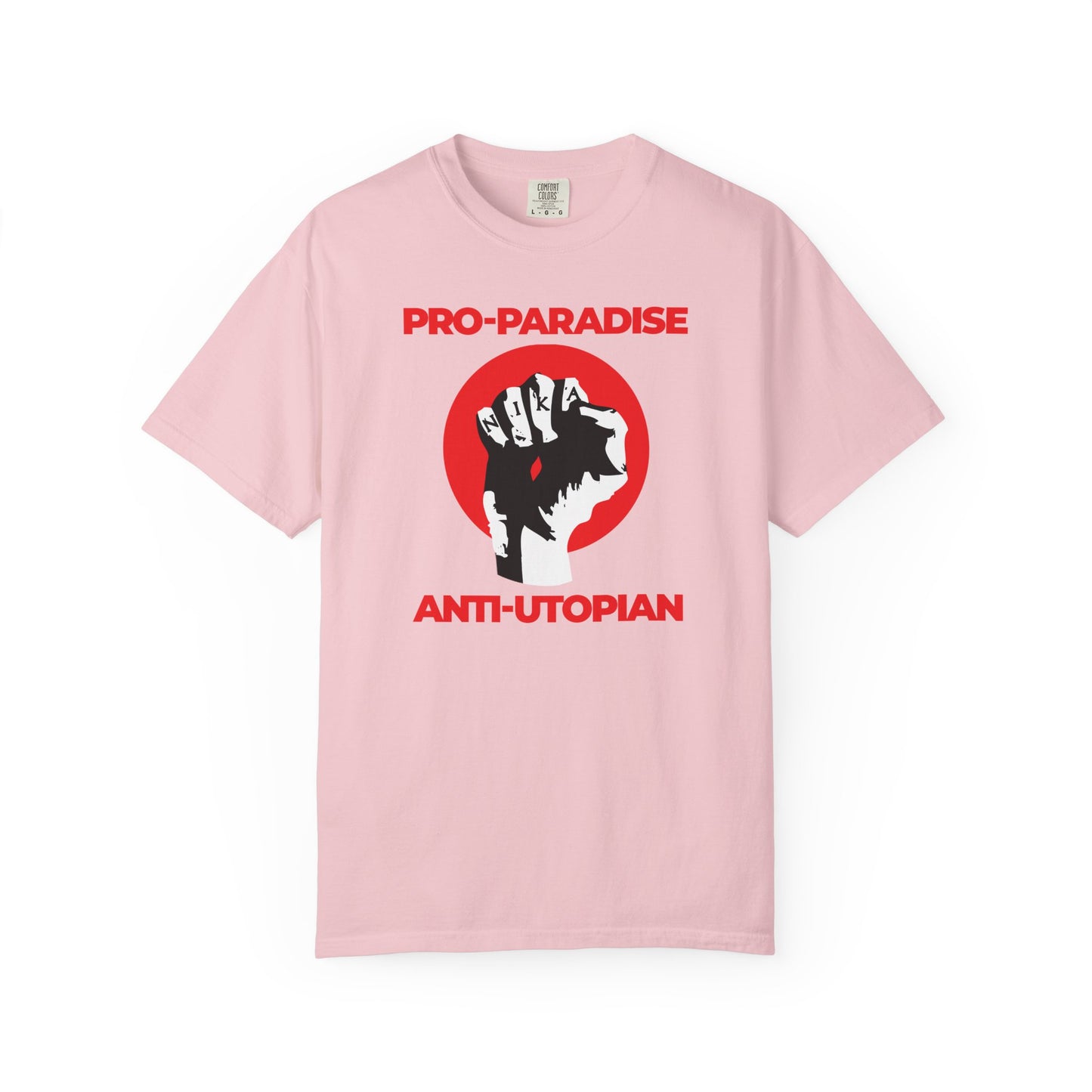 Blossom-colored heavyweight cotton unisex tee featuring a raised fist and "Pro-Paradise Anti-Utopian" design with Jesus Christ Crucified NIKA, encouraging resistance of the dominant secular paradigm.