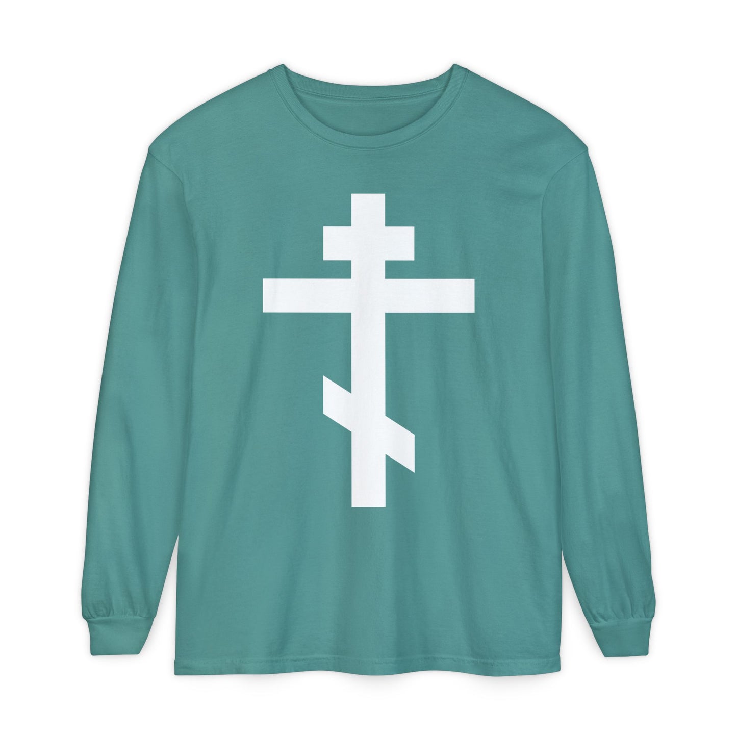 Teal long-sleeve shirt featuring a large white Orthodox Cross and the message: “May I never boast, except in the cross of our Lord Jesus Christ” (Gal 6:14). Orthodox Long Sleeve Shirt inspired by spiritual tradition.