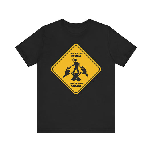 Black unisex tee featuring a yellow street sign graphic with stick figures and text "Gates of Hell Shall Not Prevail," referencing trampling down death by death, inspired by Isaiah 45:2-3. Lightweight cotton, minimalist Pascha icon design.
