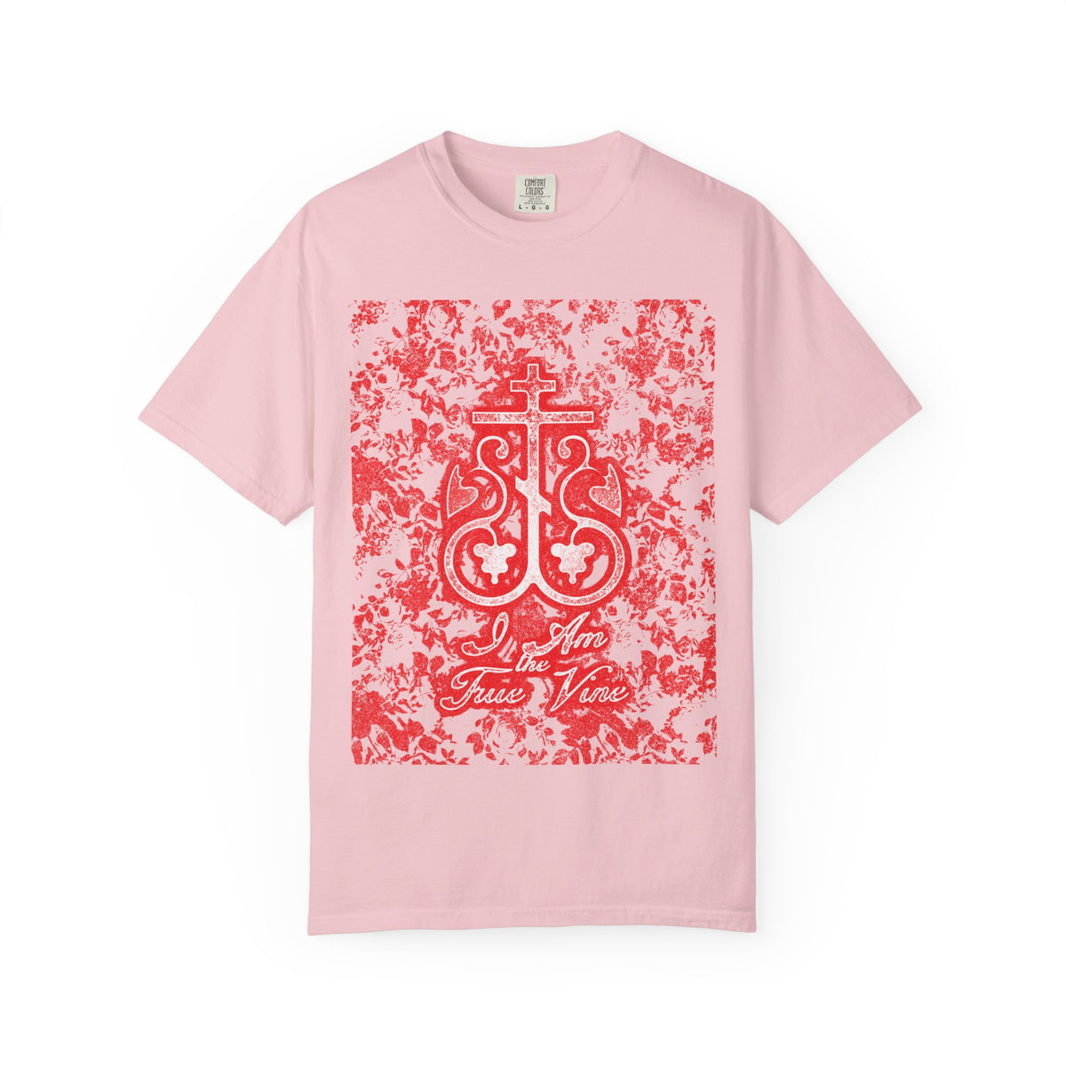 Wearing the “I Am the True Vine (John 15:1) | Orthodox Cross Vine Monogram” heavyweight cotton unisex tee in Blossom, featuring a striking red and black floral design with a stylized cross and inspiring text—a meaningful Orthodox reminder from John 15:1 to bear spiritual fruit each day.