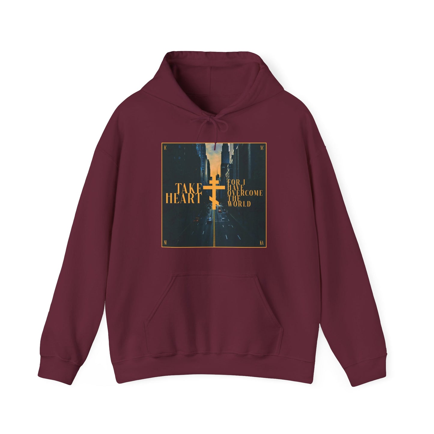 The maroon "Take Heart, For I Have Overcome the World (John 16:33)" hoodie features a modern city scene, gold cross, and inspiring text—a stylish Orthodox Christian reminder of hope through faith.