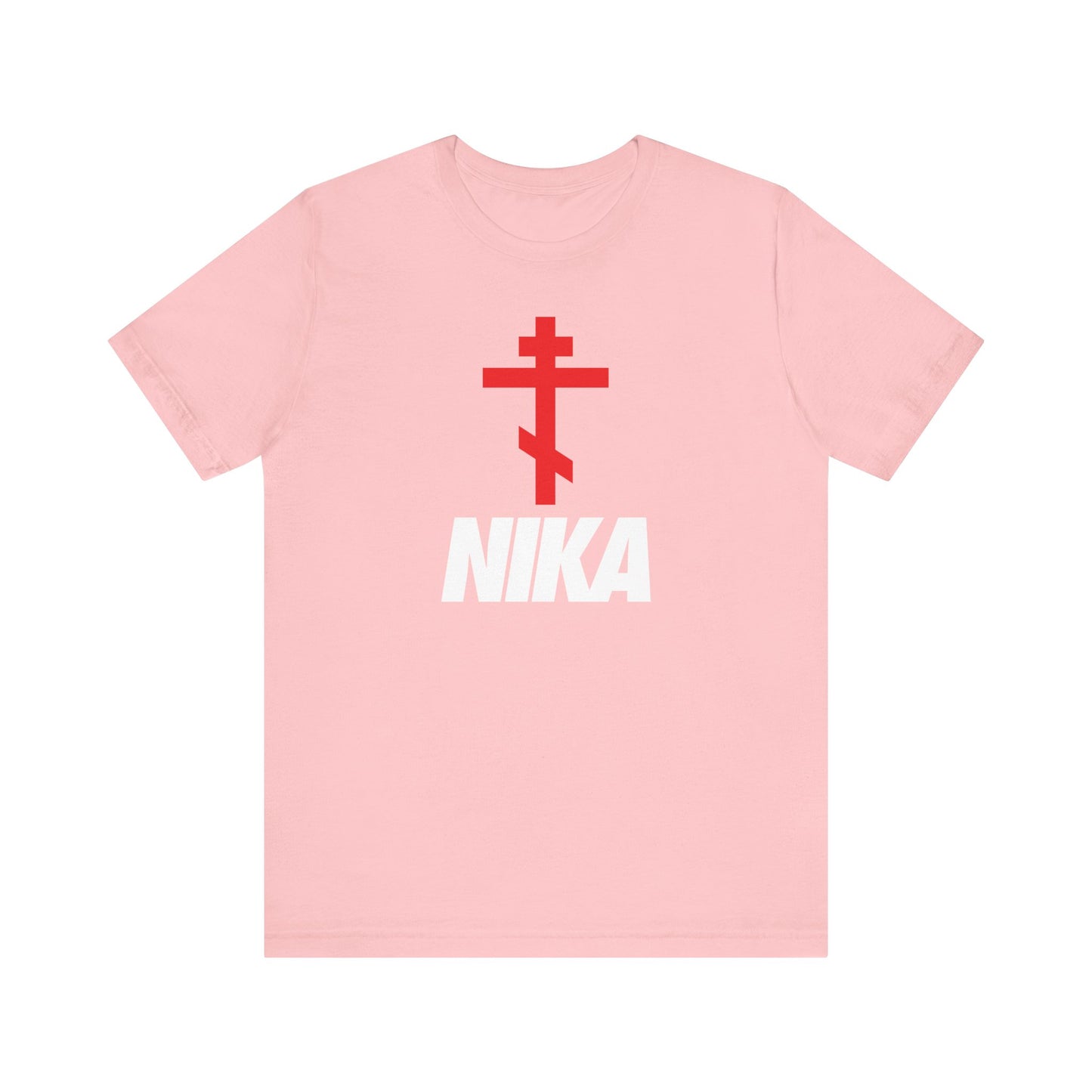 Pink unisex tee featuring a bold white "NIKA" below a red Orthodox cross—timeless Christogram meaning "Jesus Christ Conquers." Minimalist, athletic design inspired by the NIKE logo. Lightweight cotton; ideal for ascetic Christian fashion.