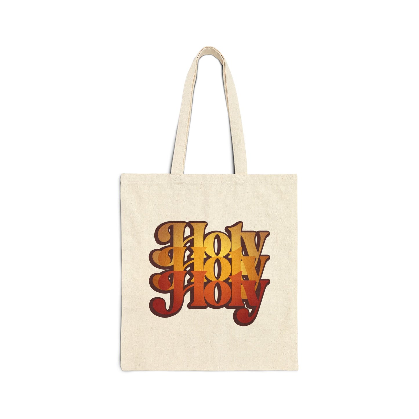 Natural tote bag featuring "Holy Holy Holy" in bold, retro orange and brown lettering inspired by Isaiah 6, with a 70s-style Trisagion design rooted in Orthodox Christian tradition.