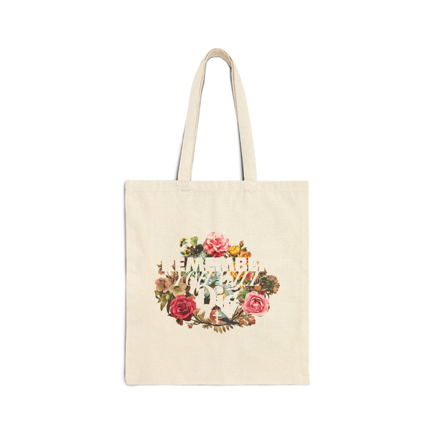 Natural tote bag featuring "Remember You Will Die" in classic typography with a cross and floral wreath design, inspired by Orthodox Christian memento mori teachings. Displayed on a white background.
