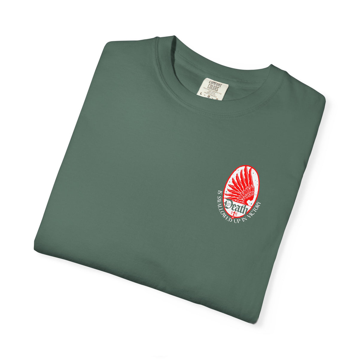 Folded sage green Death is Swallowed Up In Victory T-Shirt featuring a red oval eagle wing and stars emblem.
