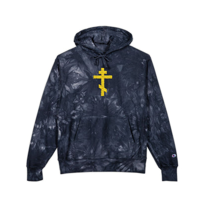 The Yellow Orthodox Cross Unseen Warfare tie-dye heavy hoodie features a yellow embroidered cross design, inspired by St. John of Kronstadt—Orthodox Christian premium streetwear on a black tie-dye background.