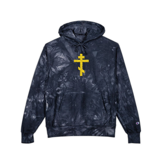 The Yellow Orthodox Cross Unseen Warfare tie-dye heavy hoodie features a yellow embroidered cross design, inspired by St. John of Kronstadt—Orthodox Christian premium streetwear on a black tie-dye background.
