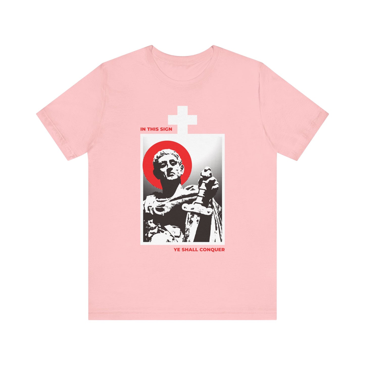 This pink lightweight cotton unisex t-shirt, named "In This Sign Ye Shall Conquer," features a stylized graphic of the statue of St Constantine the Great with a sword, accented by a white cross and bold red text that proclaims "IN THIS SIGN YE SHALL CONQUER"—a powerful call to conquer your passions and steadfastly follow in faith.