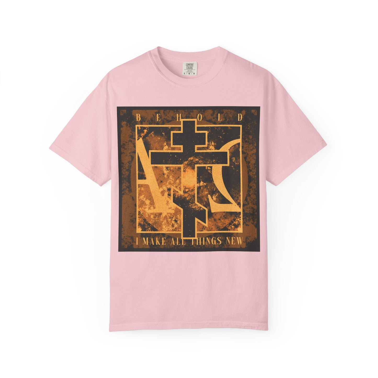 Blossom-colored heavyweight cotton unisex t-shirt featuring a bold brown and orange Orthodox cross with Alpha & Omega background and the words "Behold, I Make All Things New (Rev 21:5)", inspired by the promise of a new heaven and new earth.