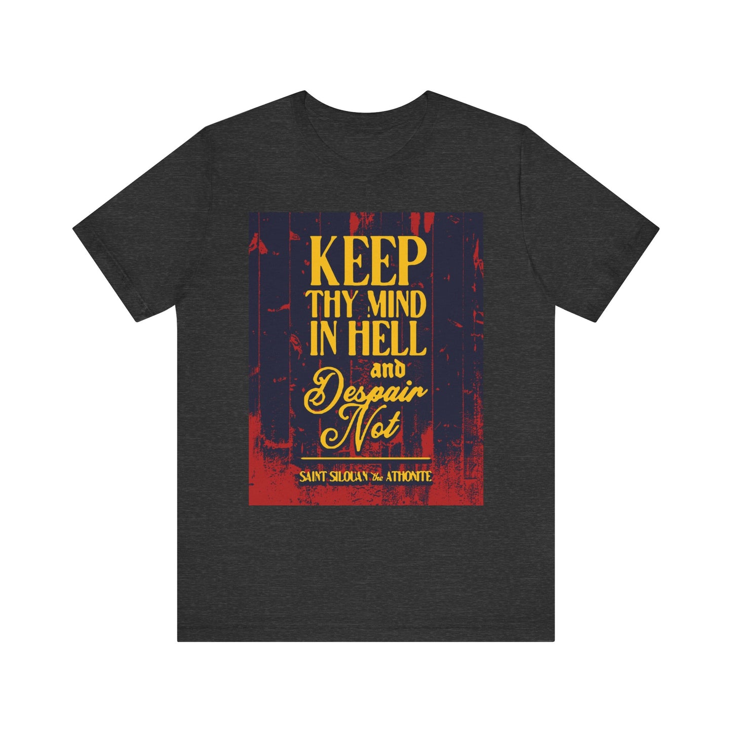 Dark Grey Heather unisex tee featuring yellow "Keep thy mind in hell and despair not" text—a tribute to St. Silouan the Athonite’s message of humility and spiritual warfare. Lightweight Orthodox Christian cotton shirt.