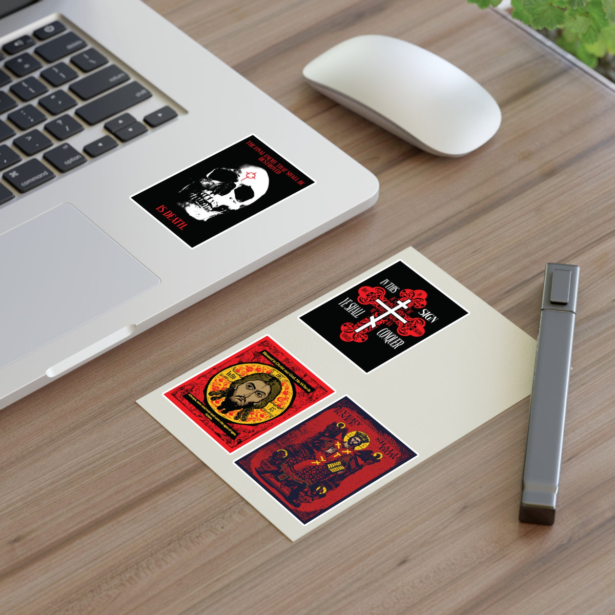 Bestseller Orthodox Sticker Mix No. 3 displayed on a desk near a laptop, with a plant in the corner.
