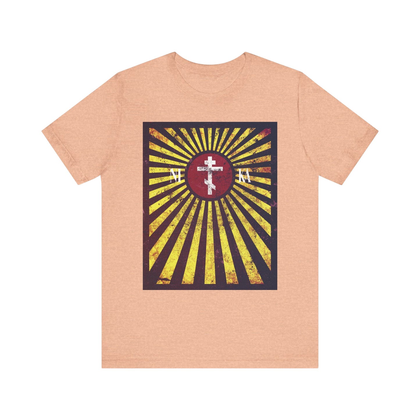 Heather peach lightweight cotton unisex t-shirt featuring the NIKA Red Rising Sun Cross with golden rays and a distressed textured flag design in red, yellow, and black—symbolizing the ladder to Heaven and the cross to bear, inspired by St. Paisios of Mount Athos.