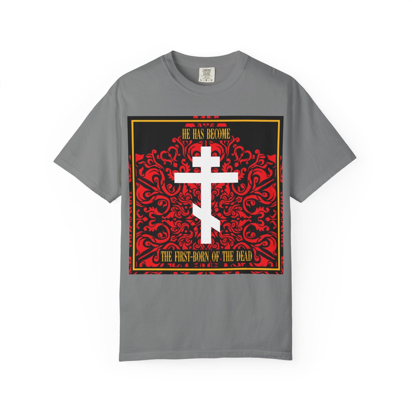 Presenting the "He Has Become the First-Born of the Dead" heavyweight cotton unisex tee in grey, featuring an elegant white Orthodox cross set against a rich red floral texture. This classic Christian t-shirt beautifully displays the bible verse: “He has become the first-born of the dead.” Perfect for expressing your faith with style and comfort.