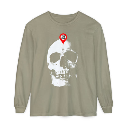 The sandstone Orthodox long sleeve features a large white skull with a red map marker on the forehead, inspired by "You Will Be Here," Memento Mori, and St. Ignatius Brianchaninov’s remembrance of death teachings.
