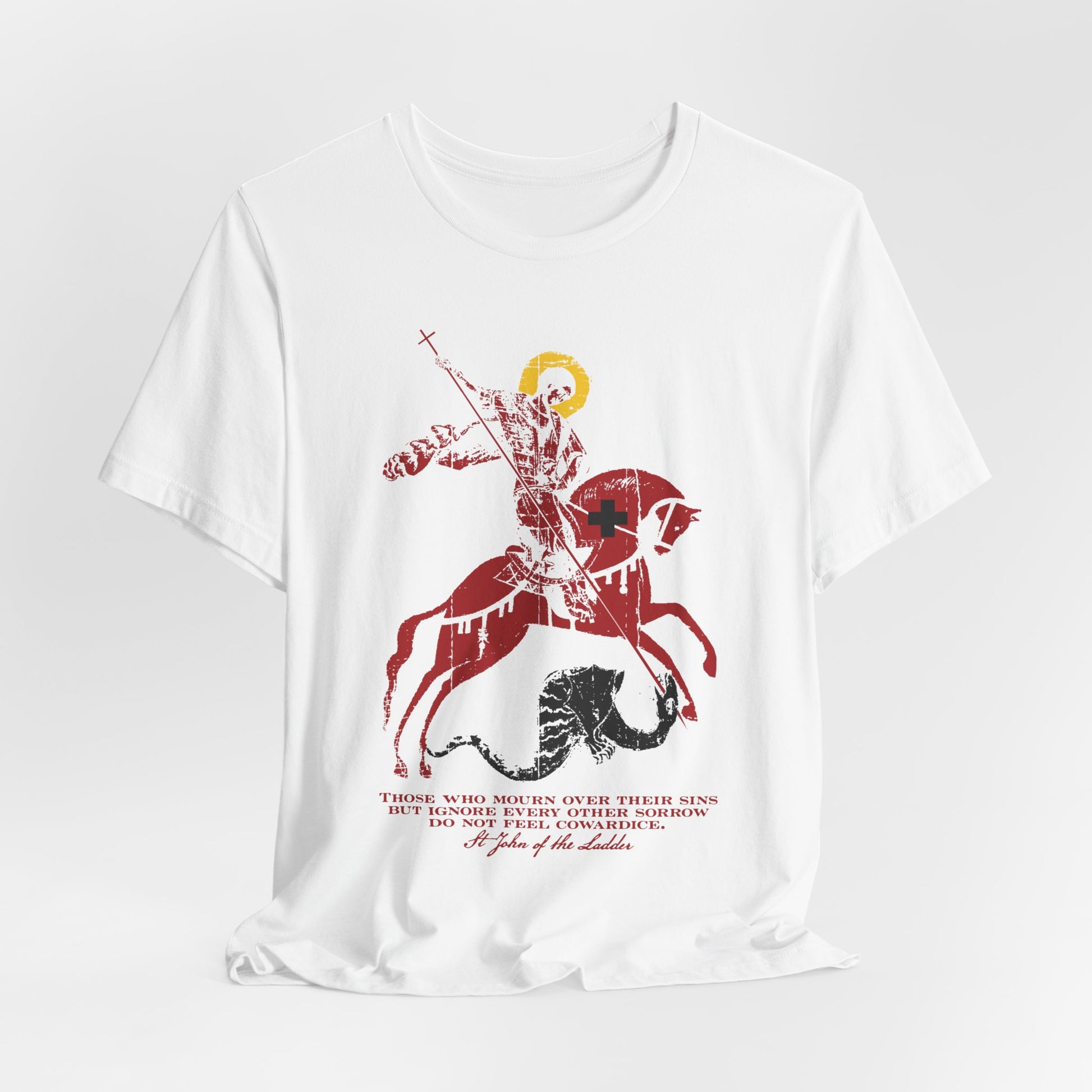 This lightweight, unisex cotton tee—titled “Those Who Mourn Over Their Sins”—features a striking iconographic image of St George slaying the dragon, symbolizing the triumph over inner struggles and spiritual sorrow. Red text beneath the illustration draws inspiration from St John Climacus’s teachings on godly mourning, making it a meaningful Orthodox Christian wearable.