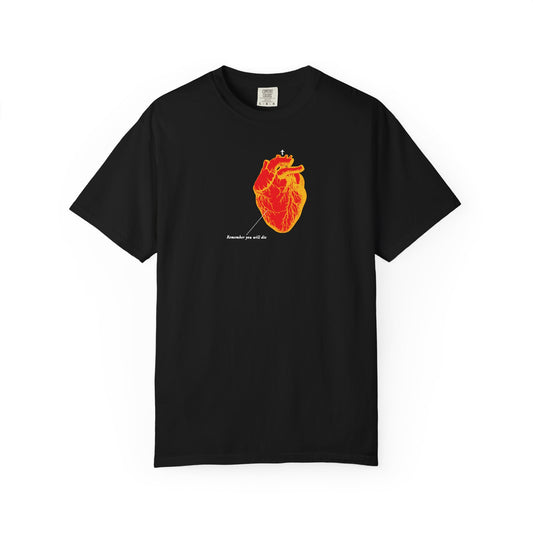 Black heavyweight cotton unisex tee with a red and orange antique medical textbook heart graphic and small white text, featuring the "Remember You Will Die" memento mori design.