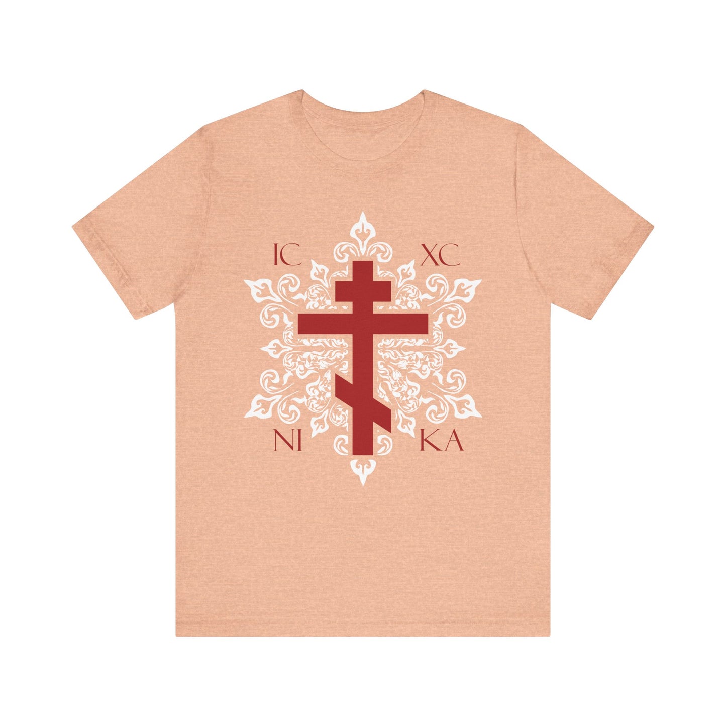 The ICXC / NIKA Red Orthodox Cross on Ornate White Medieval Floral Design lightweight cotton unisex t-shirt in Heather Peach blends faith and style, featuring a bold red cross with white floral detail and Greek lettering.