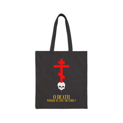 Black canvas tote bag featuring a red Orthodox cross stabbing a white skull, with yellow text: “O DEATH WHERE IS THY VICTORY?” Inspired by 1 Corinthians 15:55 and Orthodox Christian faith.