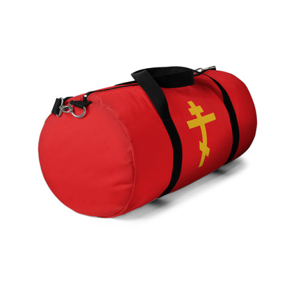 Red duffel bag with black straps, featuring a yellow Orthodox cross on a red background—Precious and Life-Giving Weapon of Unseen Warfare, Scourge of Demons; perfect Christian gym duffel inspired by Galatians 2:20.