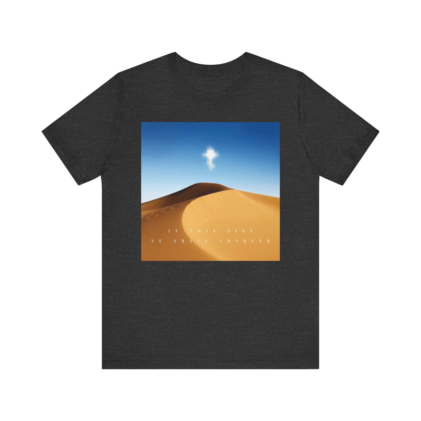 Dark Grey Heather tee showcasing a desert sun scene and the words "IN THIS SIGN YE SHALL CONQUER"—a lightweight Orthodox Christian shirt inspired by the enduring triumph of the Cross.