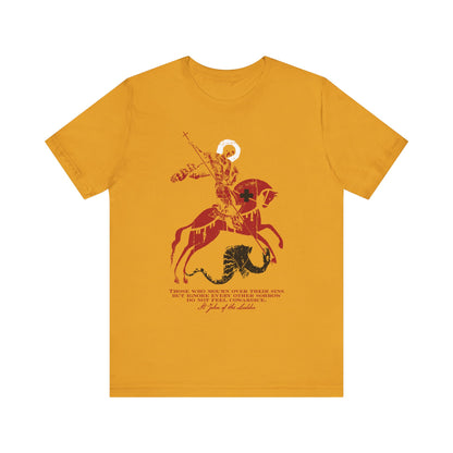 Mustard-colored unisex cotton tee featuring the “Those Who Mourn Over Their Sins” design: an iconographic depiction of St George slaying the dragon, accompanied by text inspired by St John Climacus and the Orthodox Christian understanding of godly mourning.
