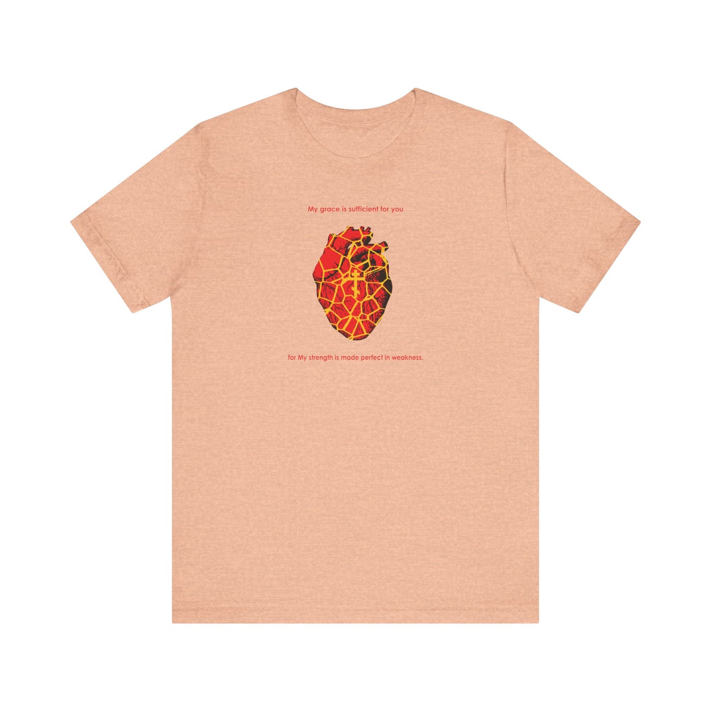 Heather Peach unisex tee features a Kintsugi-style golden broken heart with Orthodox cross and "My strength is made perfect in weakness" (2 Cor 12:9)—a reminder of hope and grace for every broken spirit. Lightweight cotton.